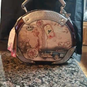 Arosa cycle purse with Paris theme.with tags new